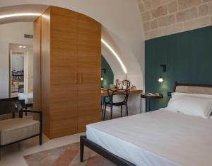 Postel nebo postele na pokoji v ubytování DOMUS DE ARMENIS