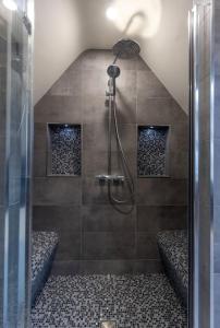 a bathroom with a shower with a glass door at LUXURY TOWN CENTRE APARTMENT in Cookstown