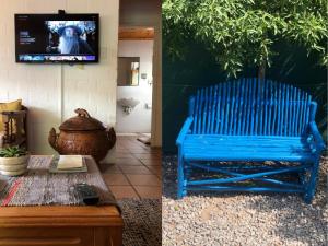 a blue bench sitting in a room with a tv at Wild Aloe in Langebaan