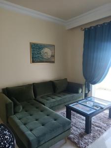 Coin salon dans l'établissement EL MANZEl 102