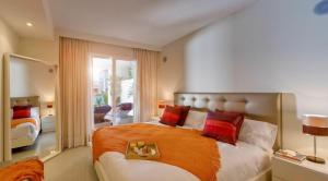 Postel nebo postele na pokoji v ubytování Cortijo Del Mar Resort