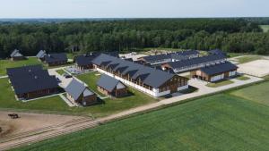 an aerial view of a farm with houses at Apartamenty Stajnia Ojcowizna in Pokrzywnica