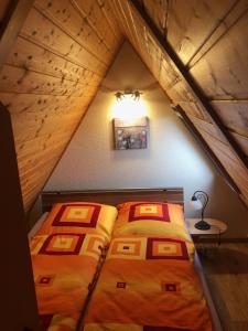 Postel nebo postele na pokoji v ubytování Ferienwohnungen Word 5 Altstadt Quedlinburg