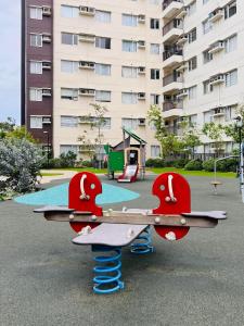 a playground with a toy airplane on a playground at * * * E Best Value Room for up to 3 in Iloilo City