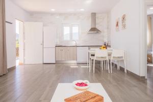 A kitchen or kitchenette at Cubo's Casita el Bancal