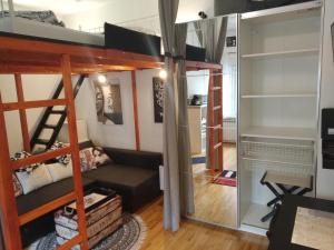 a room with bunk beds and a desk at Downtown Dream in Zagreb