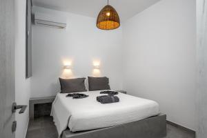 Postel nebo postele na pokoji v ubytování MaMas Oloessa Studio