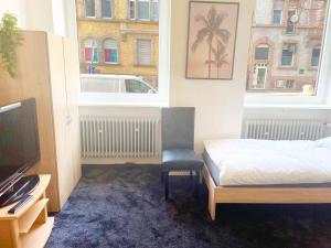 Postel nebo postele na pokoji v ubytování Spacious 4 room apartment in Hanau