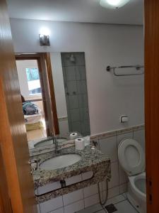 Ванная комната в Apart no Águas da Serra - 115B