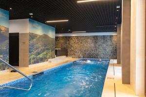Bazén v ubytovaní Green Park Resort D28- z dostępem do basenu, sauny, jacuzzi, siłowni alebo v jeho blízkosti