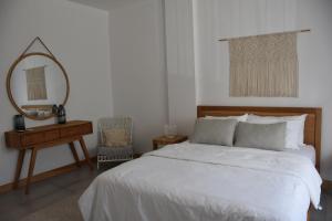 Voodi või voodid majutusasutuse Cap Sud Apartment toas
