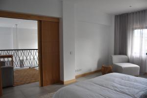 Voodi või voodid majutusasutuse Cap Sud Apartment toas