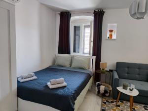 Postel nebo postele na pokoji v ubytování Apartment Augustini