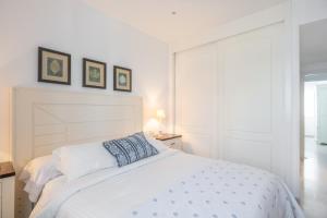 Posteľ alebo postele v izbe v ubytovaní Ático 2 terrazas junto al mar by Rent Me