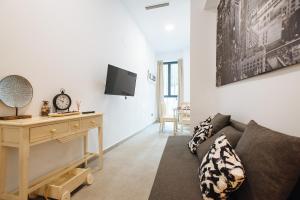 Televízia a/alebo spoločenská miestnosť v ubytovaní Apartamento céntrico en la calle Cruz Verde, 10