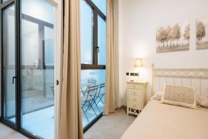 Posteľ alebo postele v izbe v ubytovaní Apartamento céntrico en la calle Cruz Verde, 10