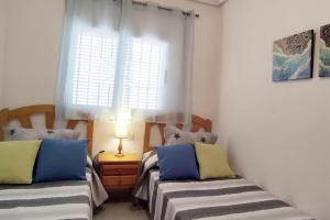 Fotografie z fotogalerie ubytování Disfruta de la playa y piscina, acogedora casa v destinaci Santa Pola