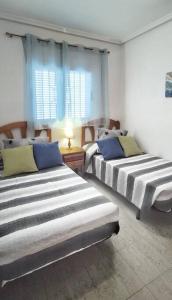 Fotografie z fotogalerie ubytování Disfruta de la playa y piscina, acogedora casa v destinaci Santa Pola