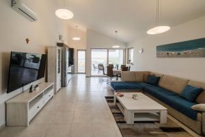 TV/trung tâm giải trí tại Penthouse Nina