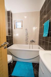 Phòng tắm tại Penthouse Nina +65 ảnh