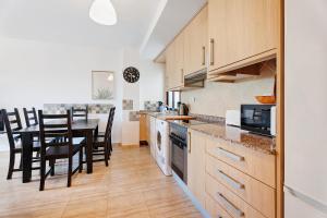 Kuchyň nebo kuchyňský kout v ubytování Apartamento Tazacorte