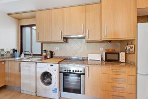 Kuchyň nebo kuchyňský kout v ubytování Apartamento Tazacorte