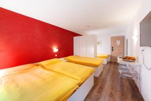 Voodi või voodid majutusasutuse Hotel Mountime toas +37 fotot