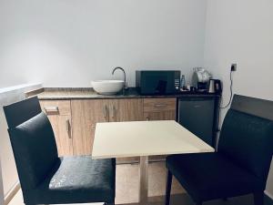 Küche/Küchenzeile in der Unterkunft Grand Hotel Central Conakry
