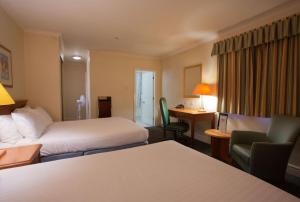 Letto o letti in una camera di Tong Park Hotel