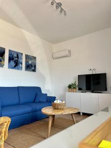 TV a/nebo společenská místnost v ubytování Sea Breeze House
