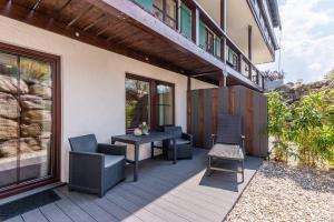Posezení v ubytování Das Maximilian - Feines Landhotel am Schliersee
