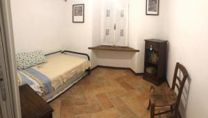 A bed or beds in a room at L'angolo nascosto