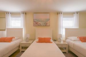 En eller flere senge i et værelse på 23 Captain Paine Road East Sandwich - - Cape Cod