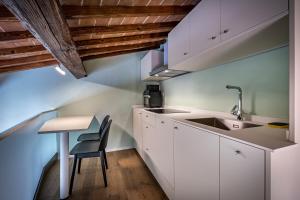 A kitchen or kitchenette at YiD Lovely Duomo suite Apt