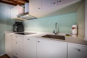 A kitchen or kitchenette at YiD Lovely Duomo suite Apt