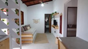 Χώρος καθιστικού στο Casa Rústica em Condomínio com Piscina