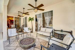 a living room with a couch and a table and chairs at Stunning Minneola Home with Private Pool and Yard! in Minneola