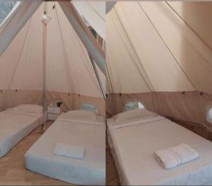 Postel nebo postele na pokoji v ubytování Omah Qu Guesthouse Malioboro