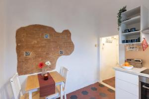 Fotografie z fotogalerie ubytování OLTRARNO Suite ve Florencii