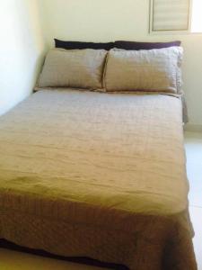 Un pat sau paturi într-o cameră la Pousada do Pascoal