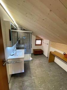 a kitchen with a sink and a counter top at Fantastic renovated Chalet in the heart of Alps in Münster