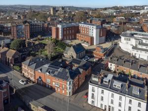 an aerial view of a city with buildings at Exeter City Centre Apartments Eden Apartment in Exeter