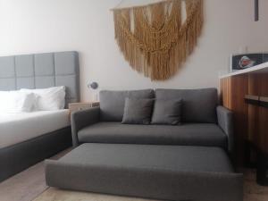 Χώρος καθιστικού στο Increíble estudio con alberca infinita +3 φωτογραφίες