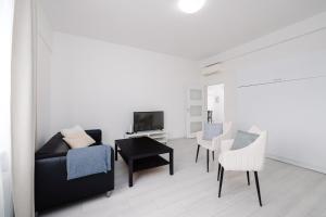 TV a/nebo společenská místnost v ubytování Self check-in apartments by Amber
