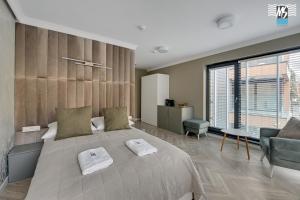 En eller flere senge i et værelse på MS Apartments Rest 2.0