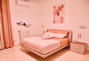 Postel nebo postele na pokoji v ubytování B&B 5 Lune