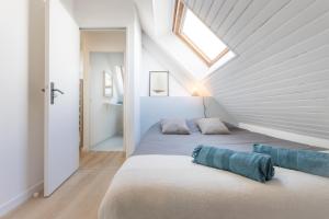 Posteľ alebo postele v izbe v ubytovaní Appartement neuf & tout confort - Proche Centre ville par Groom + 7 fotografií