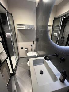 Łazienka w obiekcie Hotel Regina
