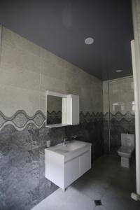 Kuchyň nebo kuchyňský kout v ubytování Guest House Nikola