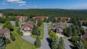 an aerial view of a home in a subdivision at Seven Springs 1 Bedroom Premium Condo, Ski In Ski Out condo in Champion